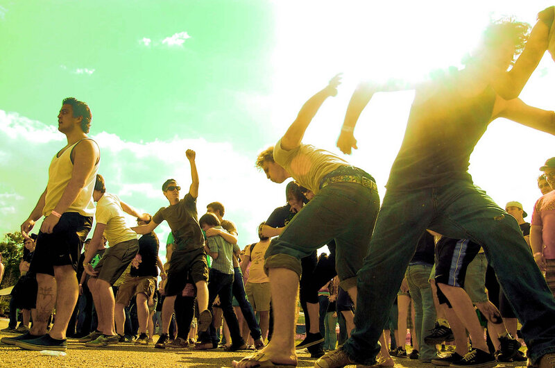 People dancing at a festival