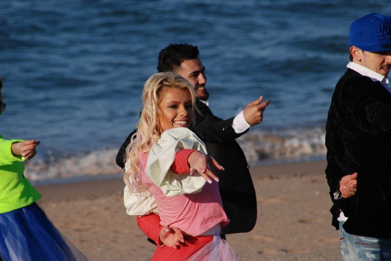 People dancing on the beach