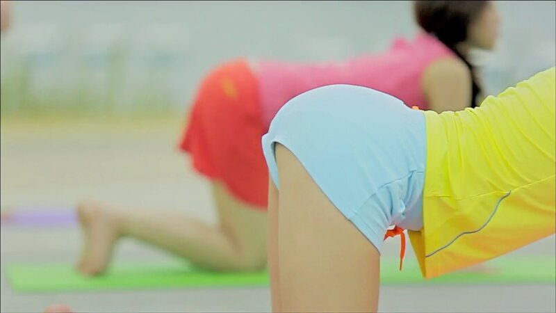 people doing yoga on mats