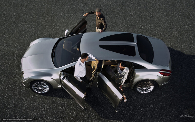 People entering a luxury car