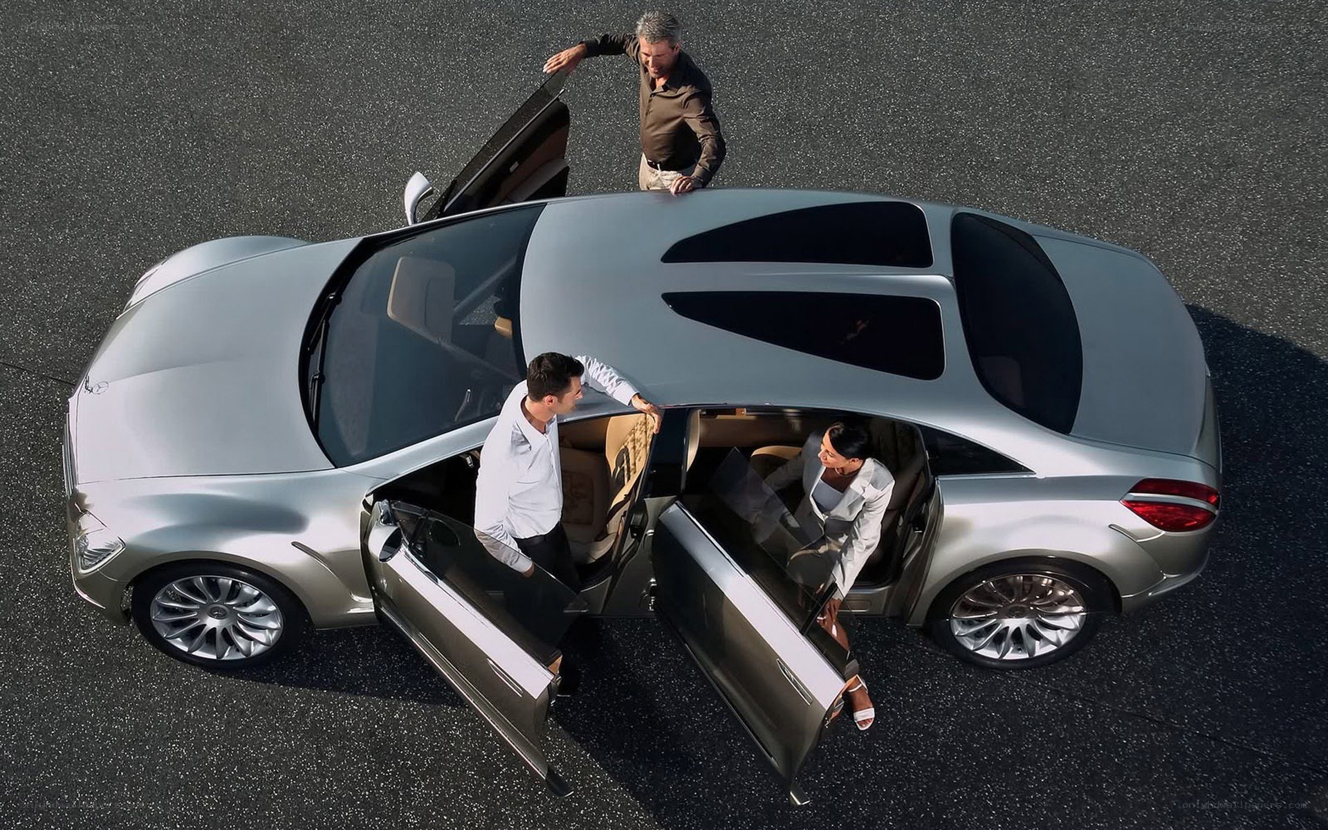 People entering luxury car