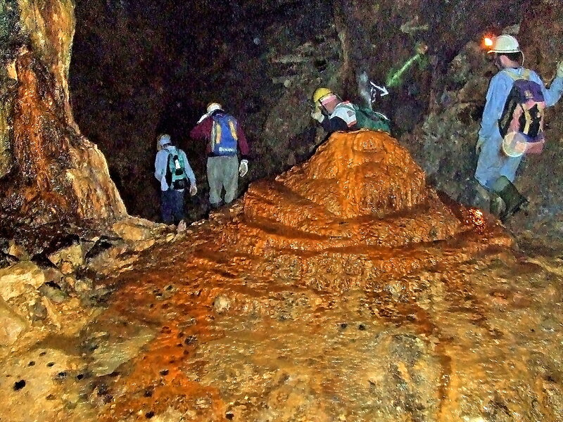 People Exploring Cave