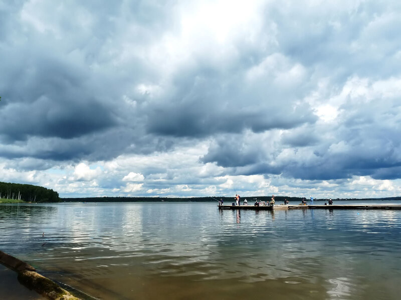 People fishing on a lake