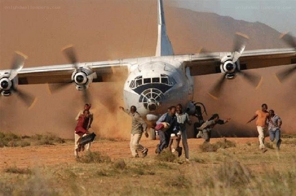 People fleeing a plane