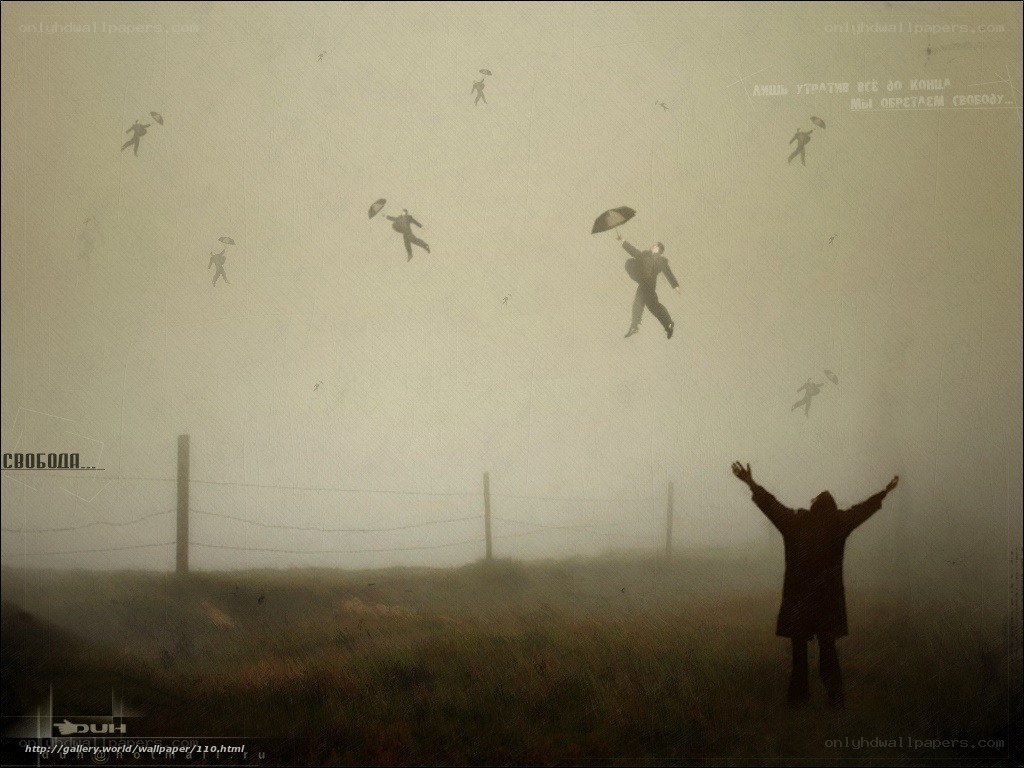 People floating with umbrellas
