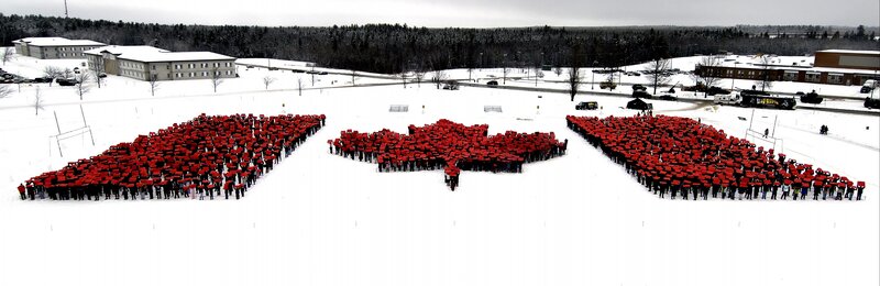 People Forming Maple Leaf