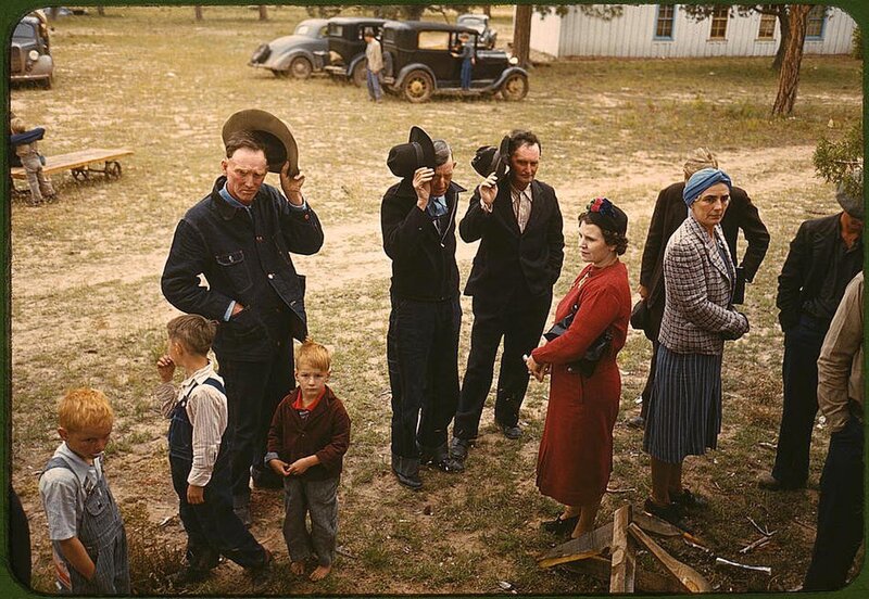 People gathered in a rural yard