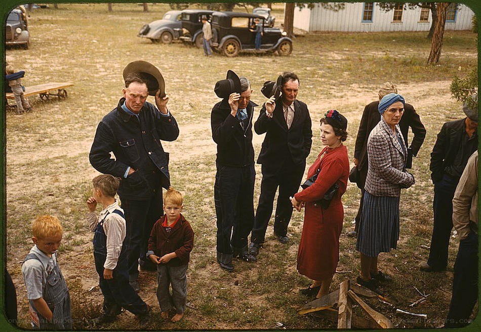 People gathered in a rural yard