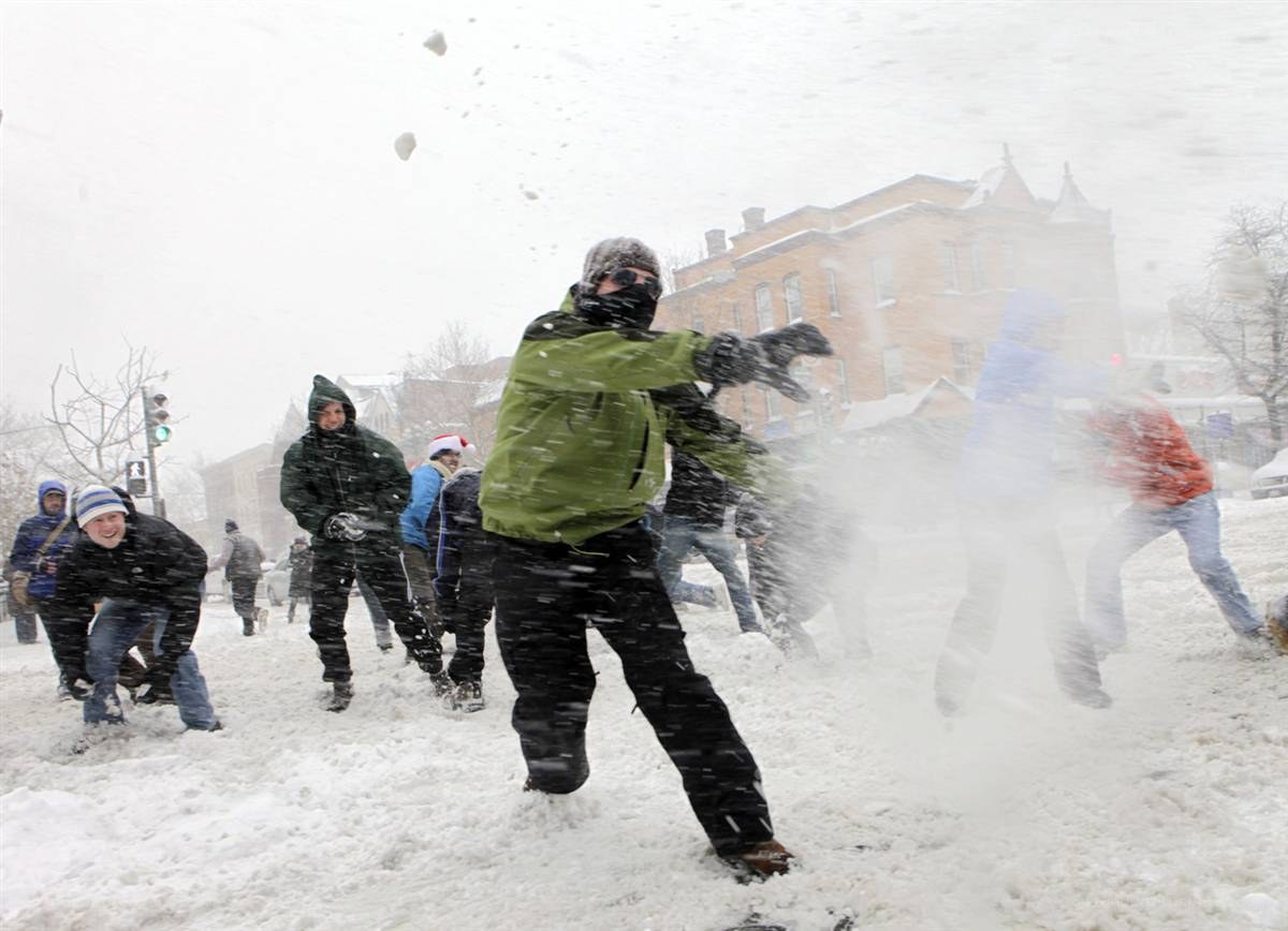 People having snowball fight