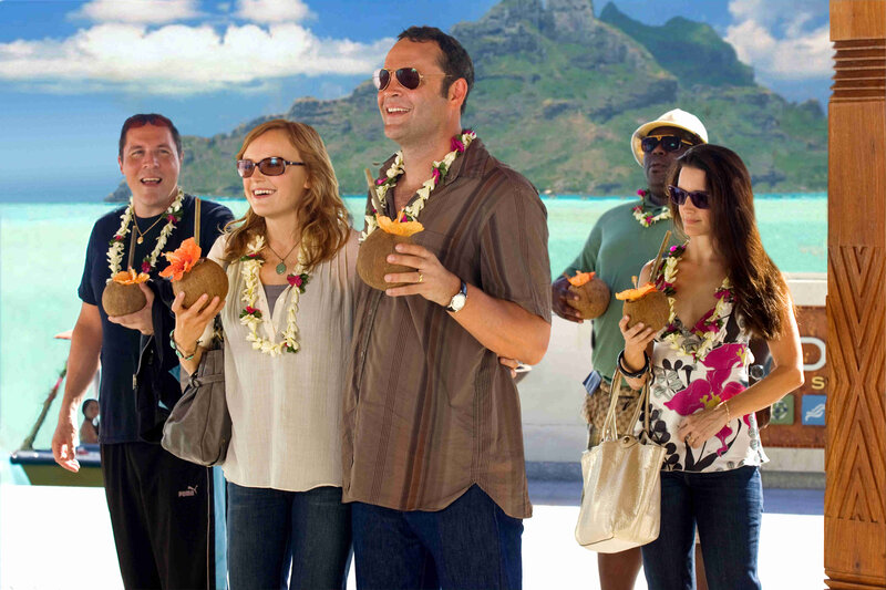 People Holding Coconuts