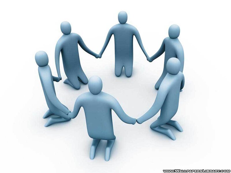 people holding hands in a circle