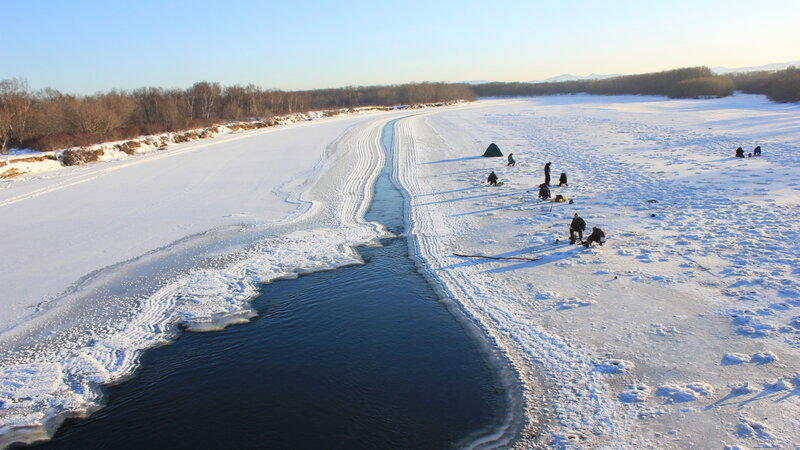 People Ice Fishing