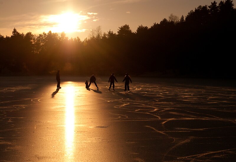 People Ice Skating — Gold