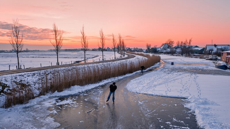 People Ice Skating — Pink