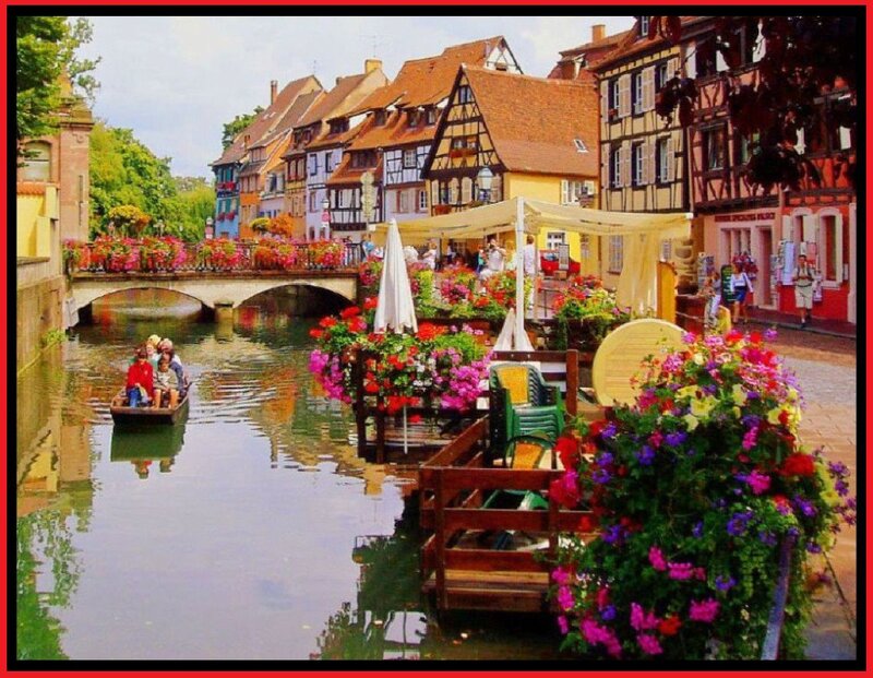 People in a Boat on a Canal — Green