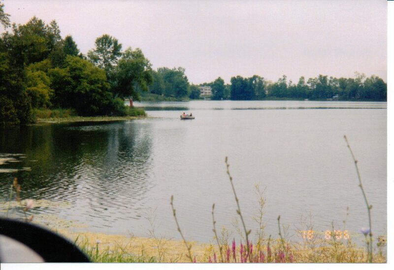 People in a Boat on Lake