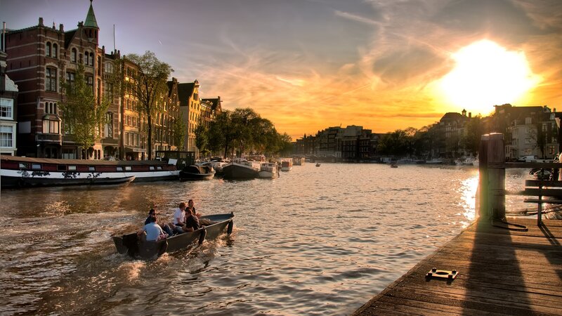People in a Boat — Orange, Serene, Sunset