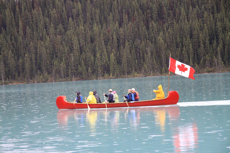 People in a Canoe — Red