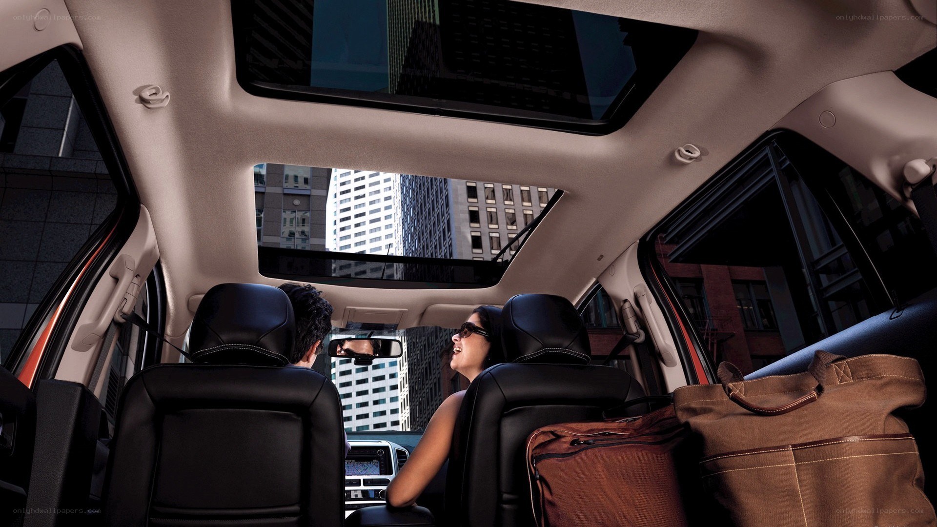 People in a car with sunroof