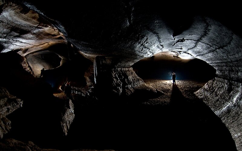 People in a Cave — Black, Dramatic
