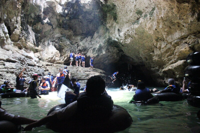 People in a Cave — Green