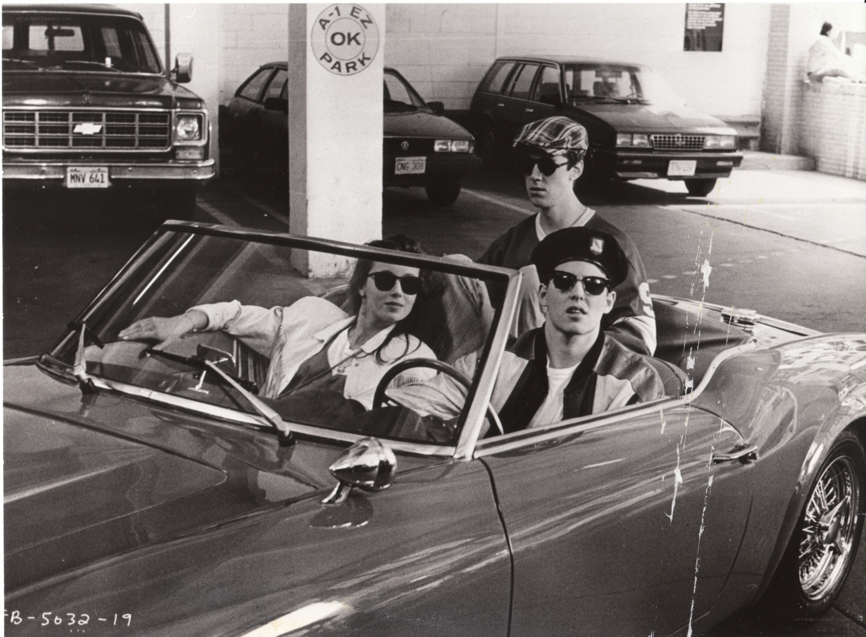 People in a convertible car