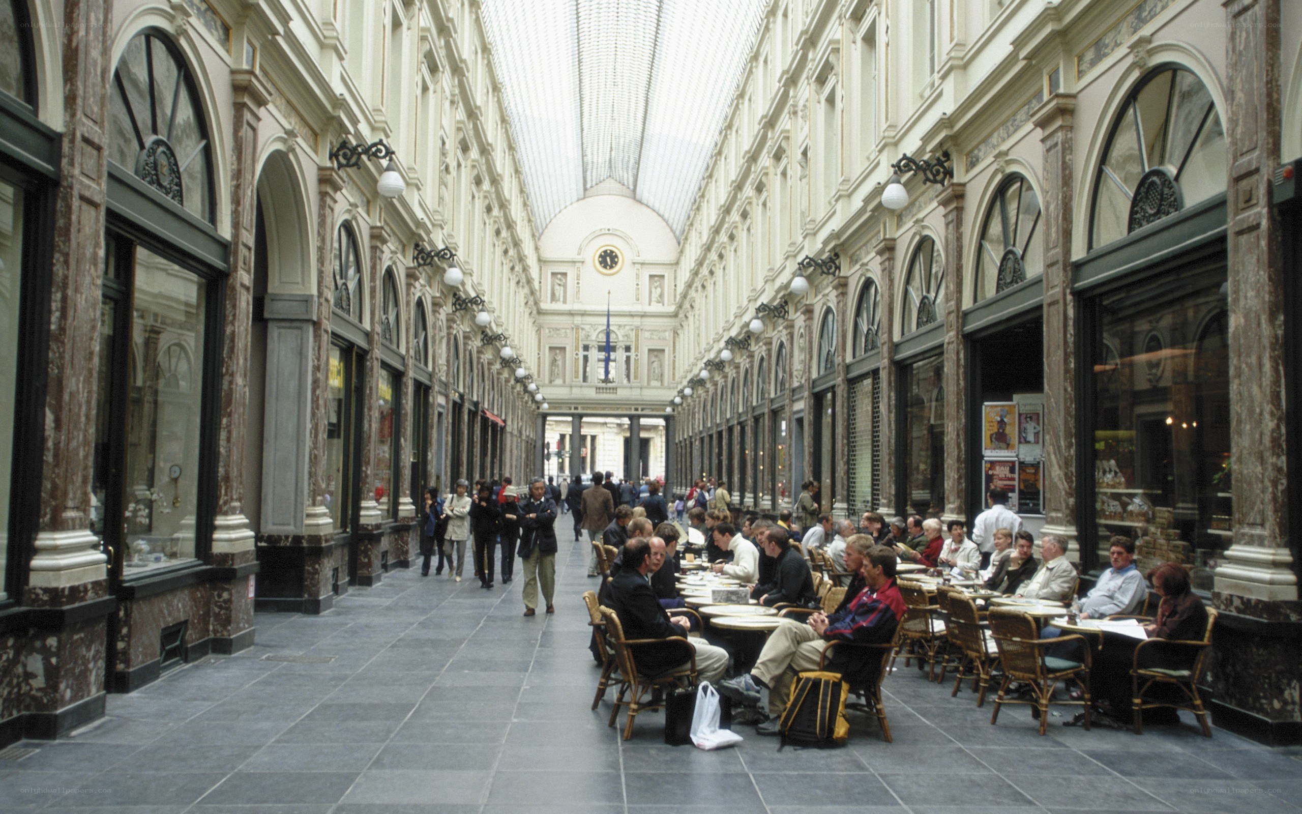 People in a covered shopping arcade