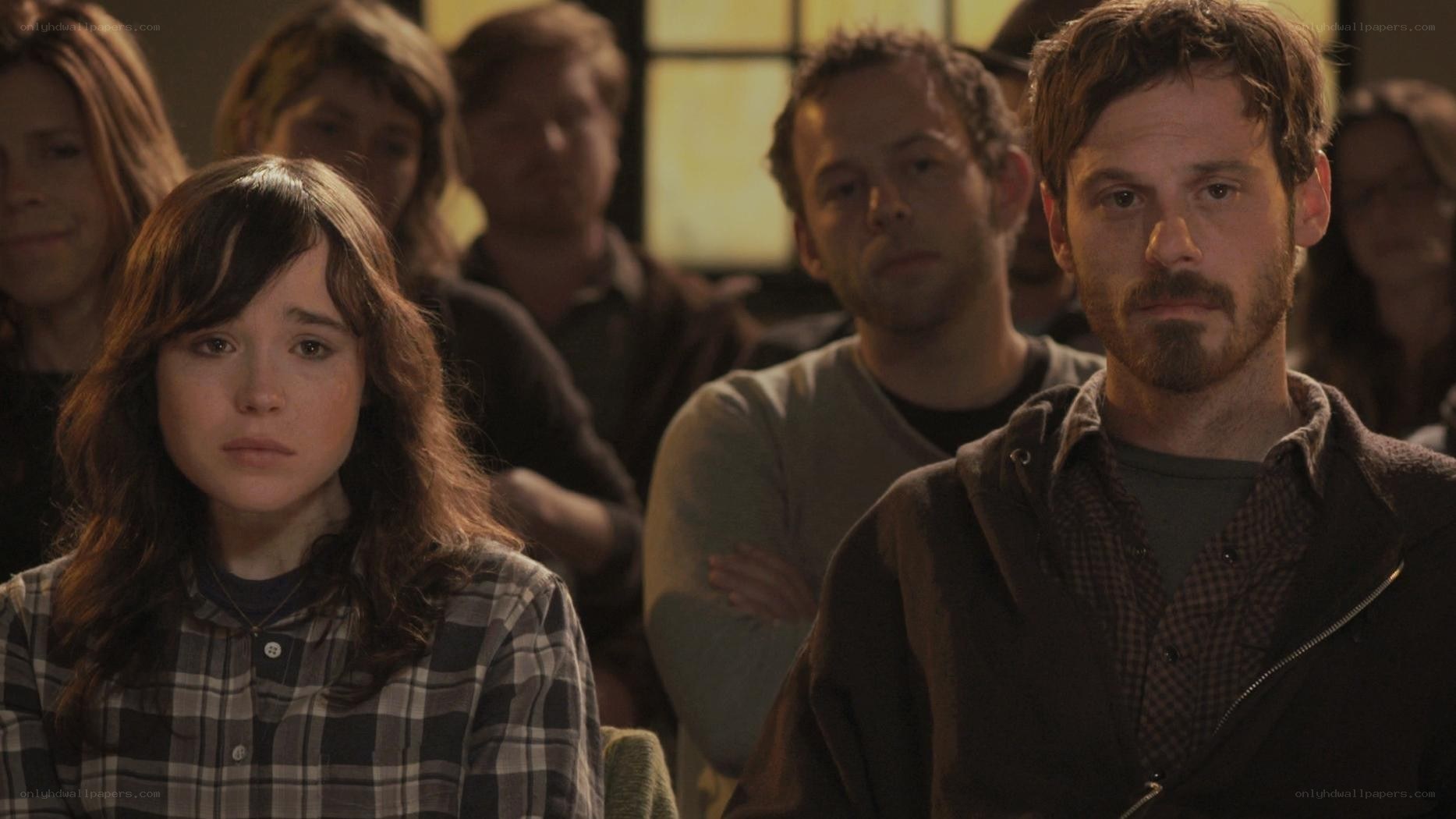 people in a dimly lit room