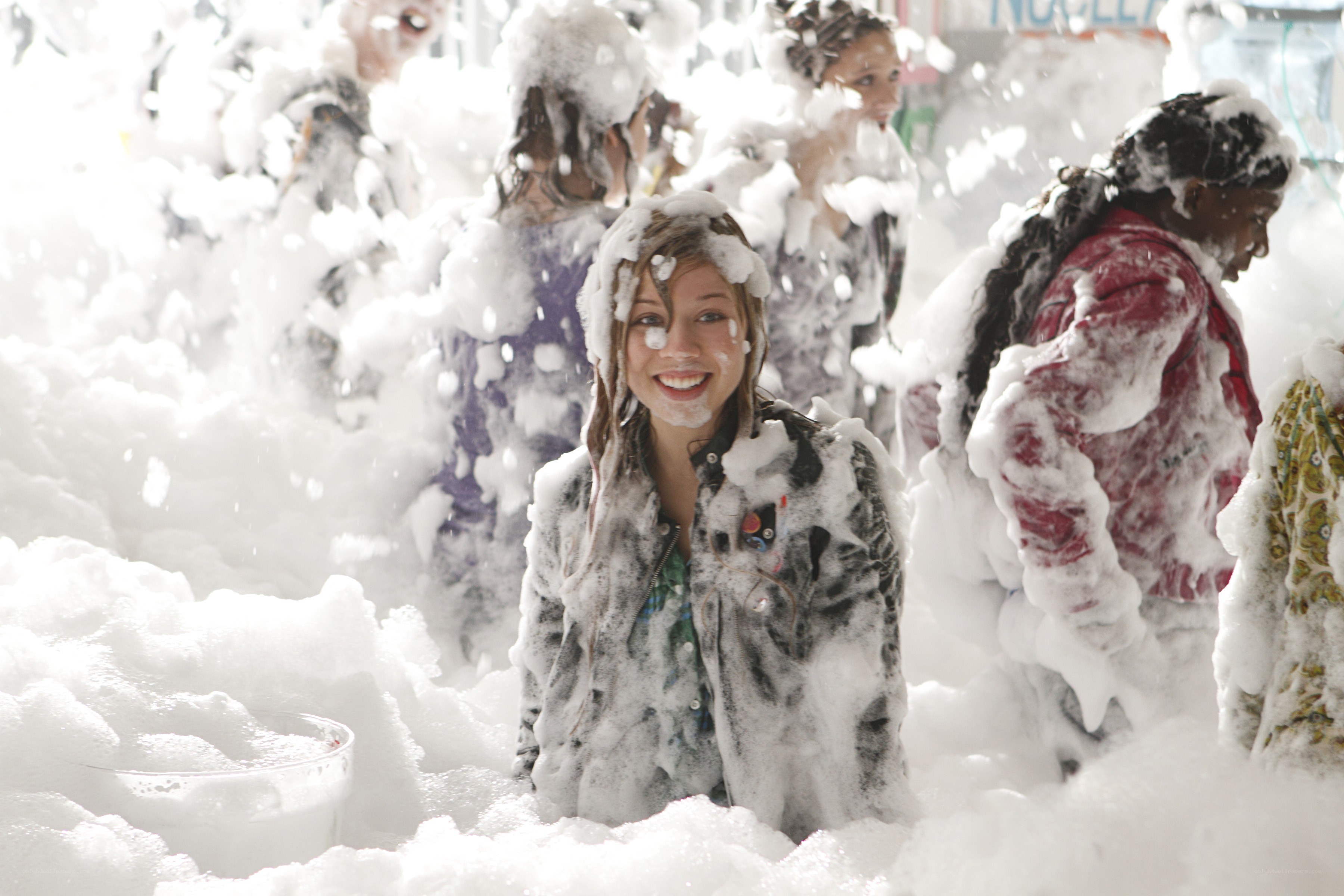 people in a foam party