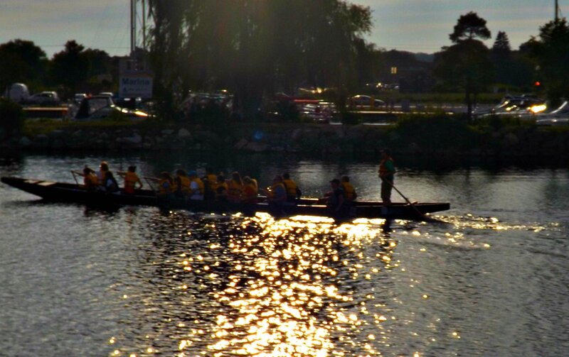 People in a Longboat — Gold