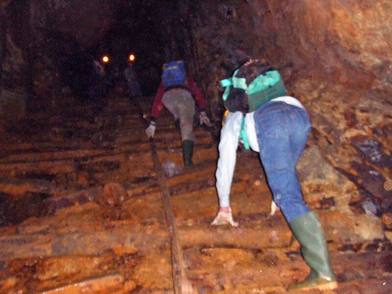 People in a Mine Tunnel