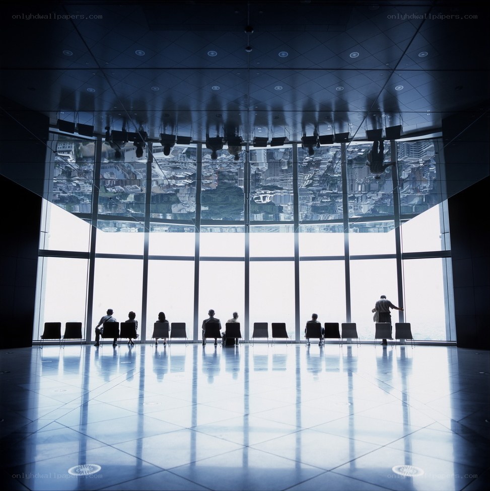 People in a modern observation lounge