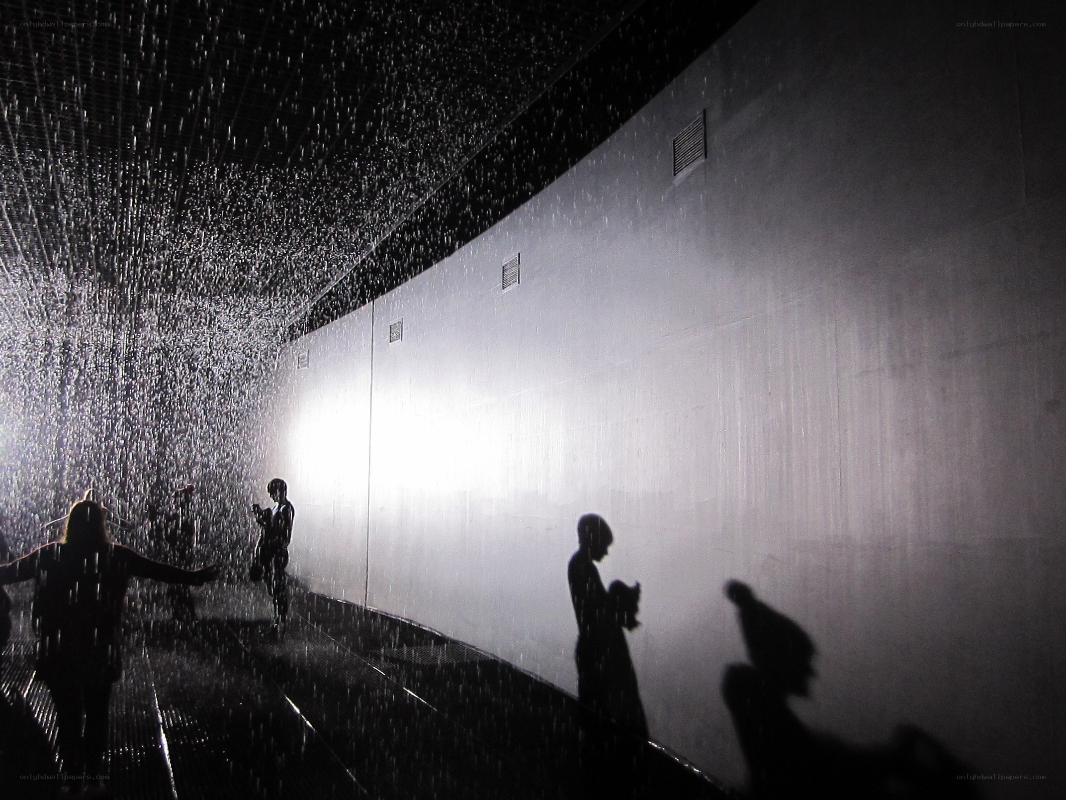 People in a rain installation