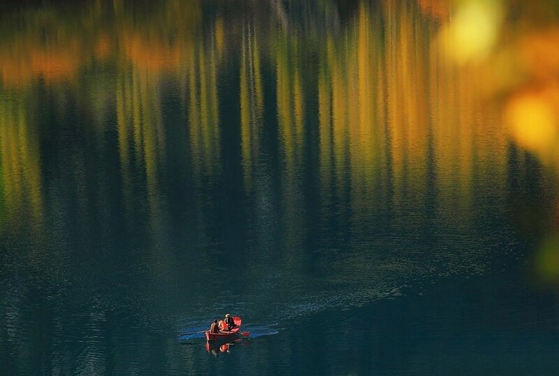 People in a Red Boat