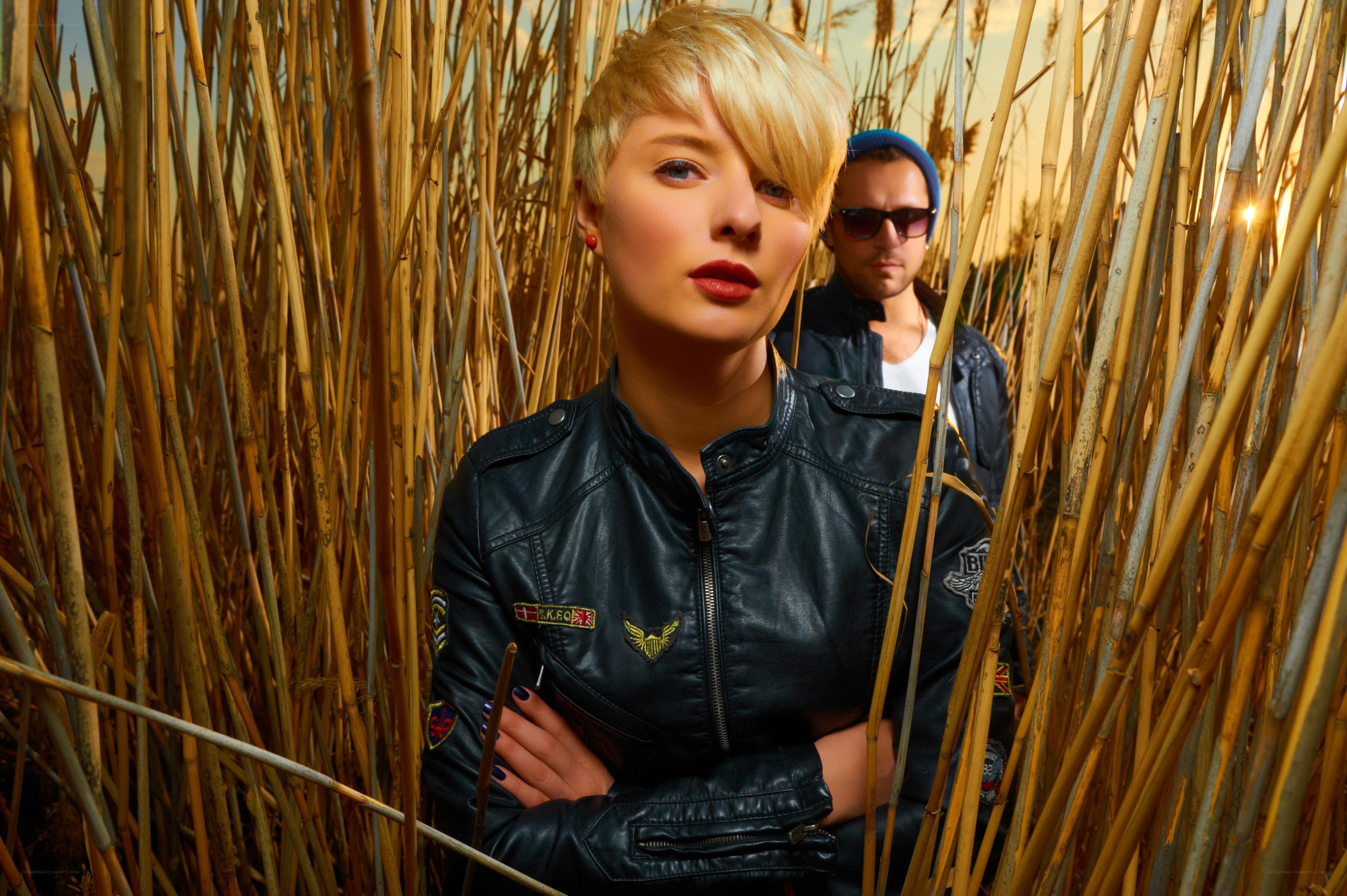 People in a reed field