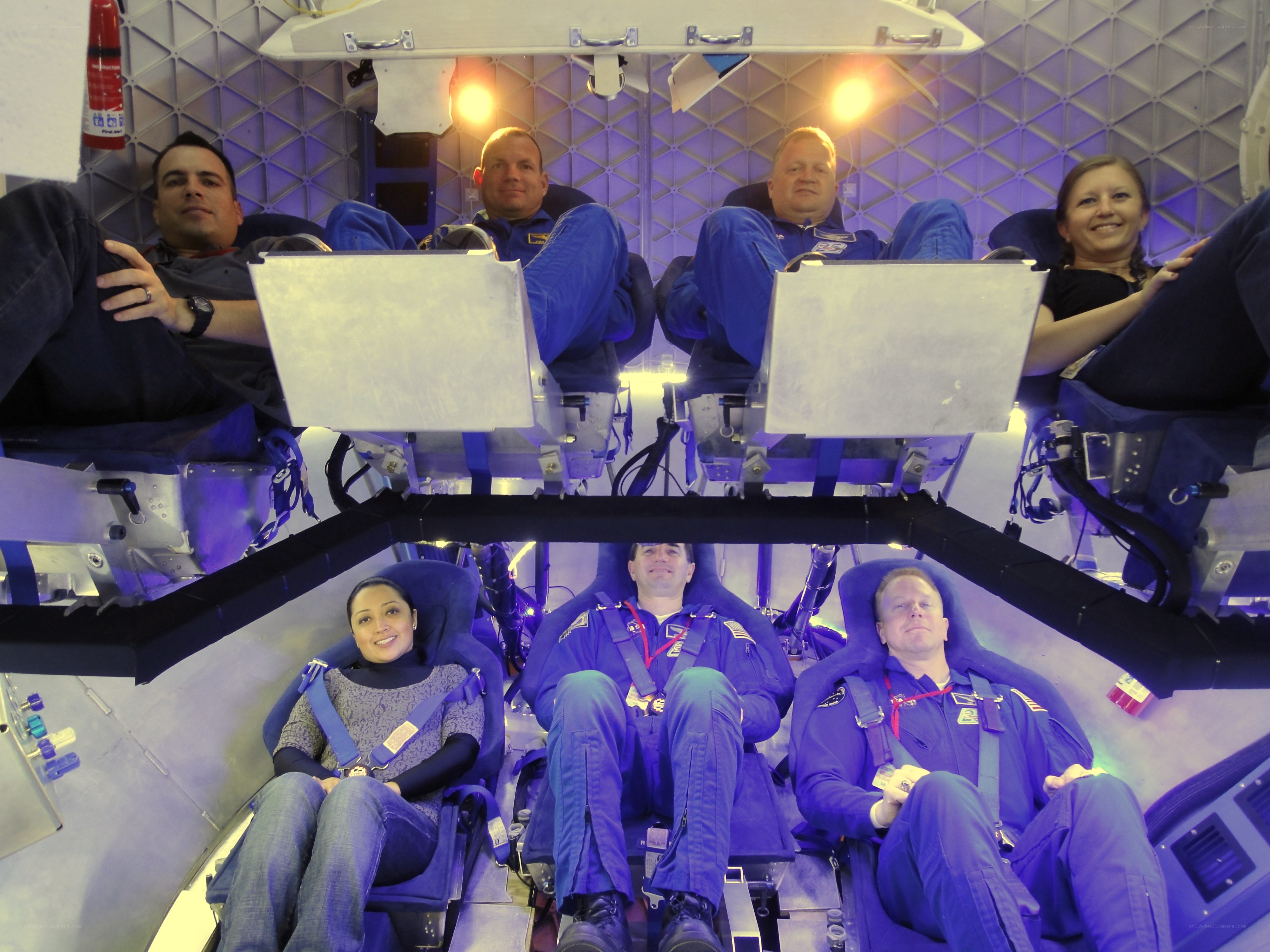 People in a spacecraft simulator