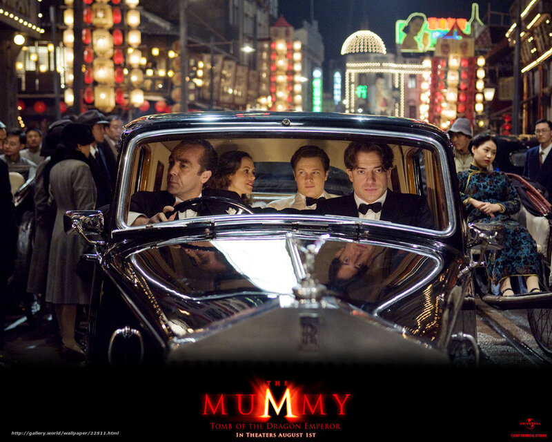 People in a Vintage Car