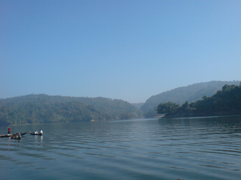 People in Boats on Lake