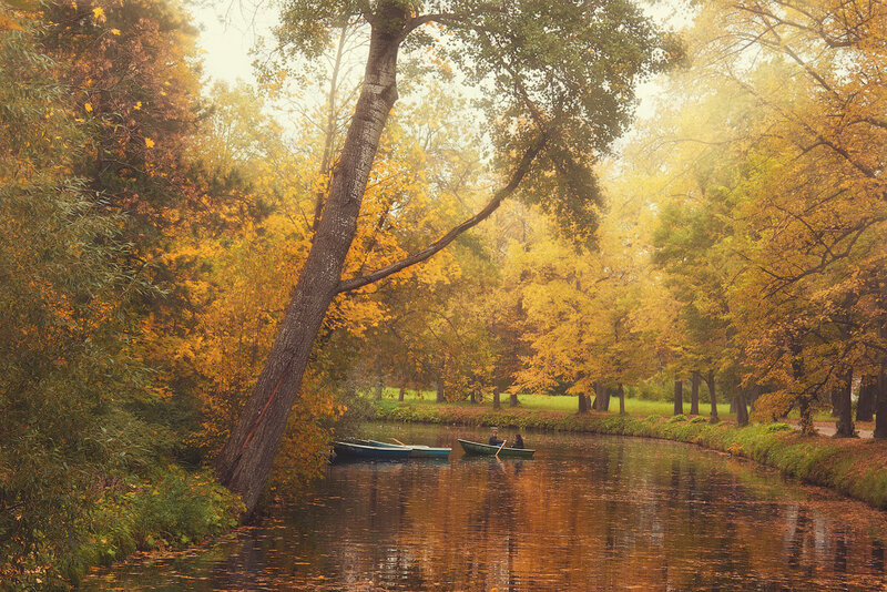 People in Boats on River