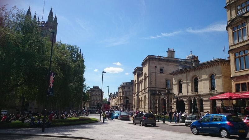People in City Square — Blue, Bright