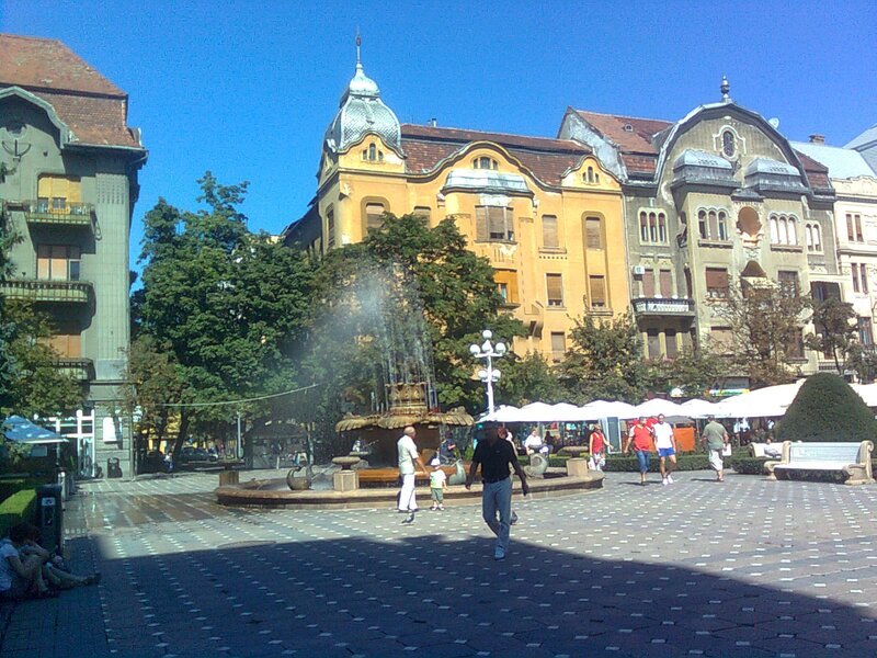 People in City Square — Blue
