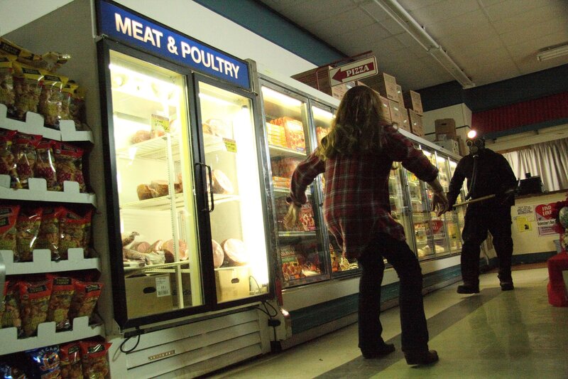 People in costumes in a grocery store