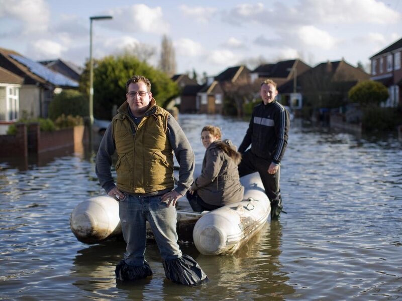 People in Flooded Street
