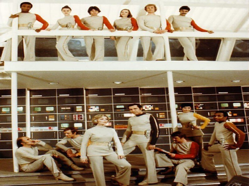 People in Futuristic Uniforms
