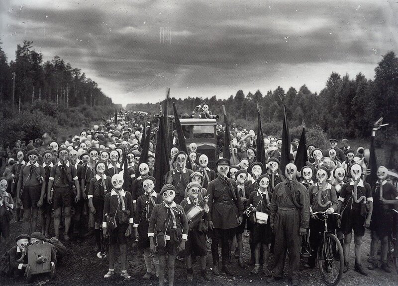 People in Gas Masks — Black, Dramatic, Photograph, Gas Masks, Flags, Truck, White