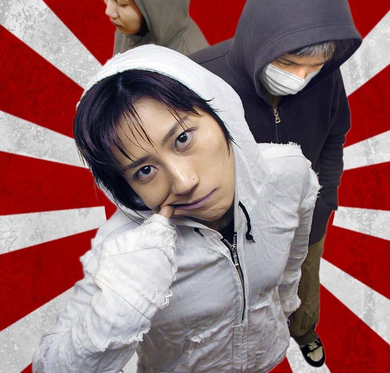 People in hoodies against flag