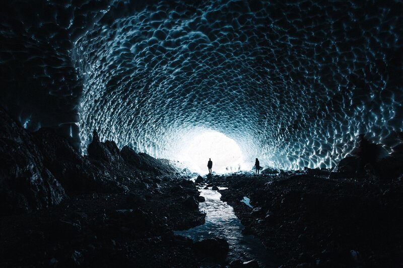 People in Ice Cave — Blue, Dramatic