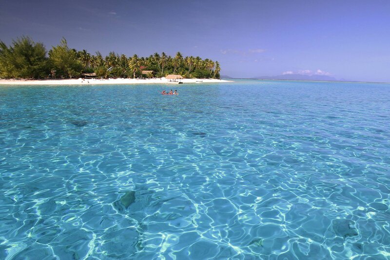 People in Kayak on Beach