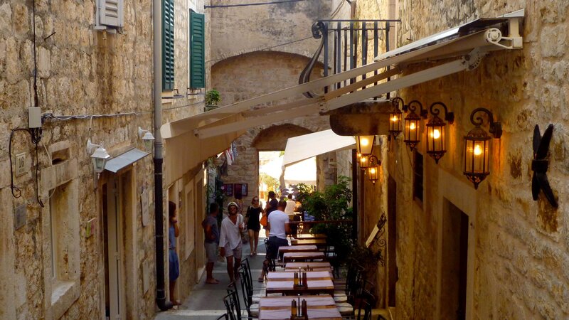People in Narrow Alley