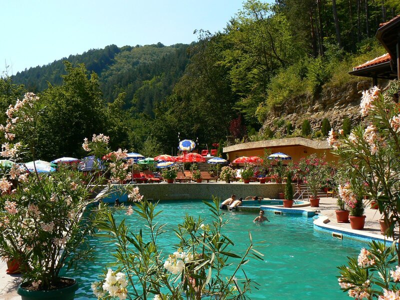 People in Outdoor Pool — Blue
